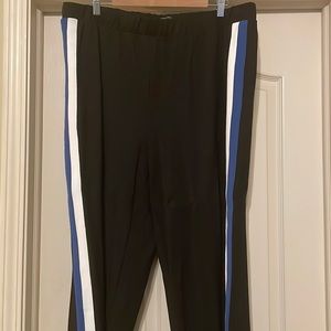 Black Stephanie pants with white and blue accents on side